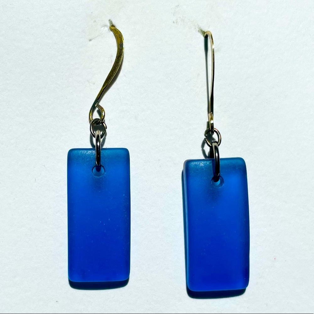 Blue sea glass earrings. (7/8” L x 3/8”W)
